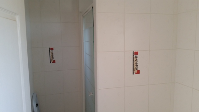 Septembre 2016 - Transformation d'une douche maçonnée en douche italienne. RSConstruction Sdbboetto2.jpg